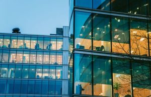 Modern commercial office building protected by backup generator power solutions.
