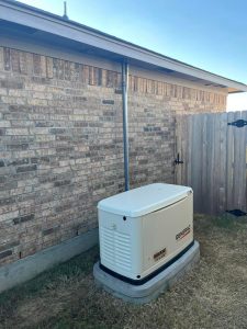 Generac standby generator installation beside a suburban Oklahoma home.